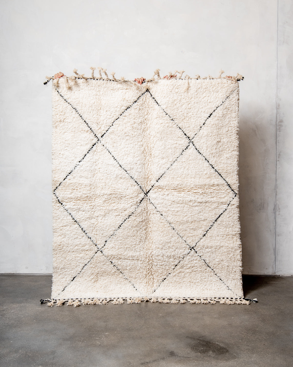 Modern, designer, handcrafted Berber rug from Morocco. Beniourain carpet with minimalist design, natural wool pile and a fluffy texture.