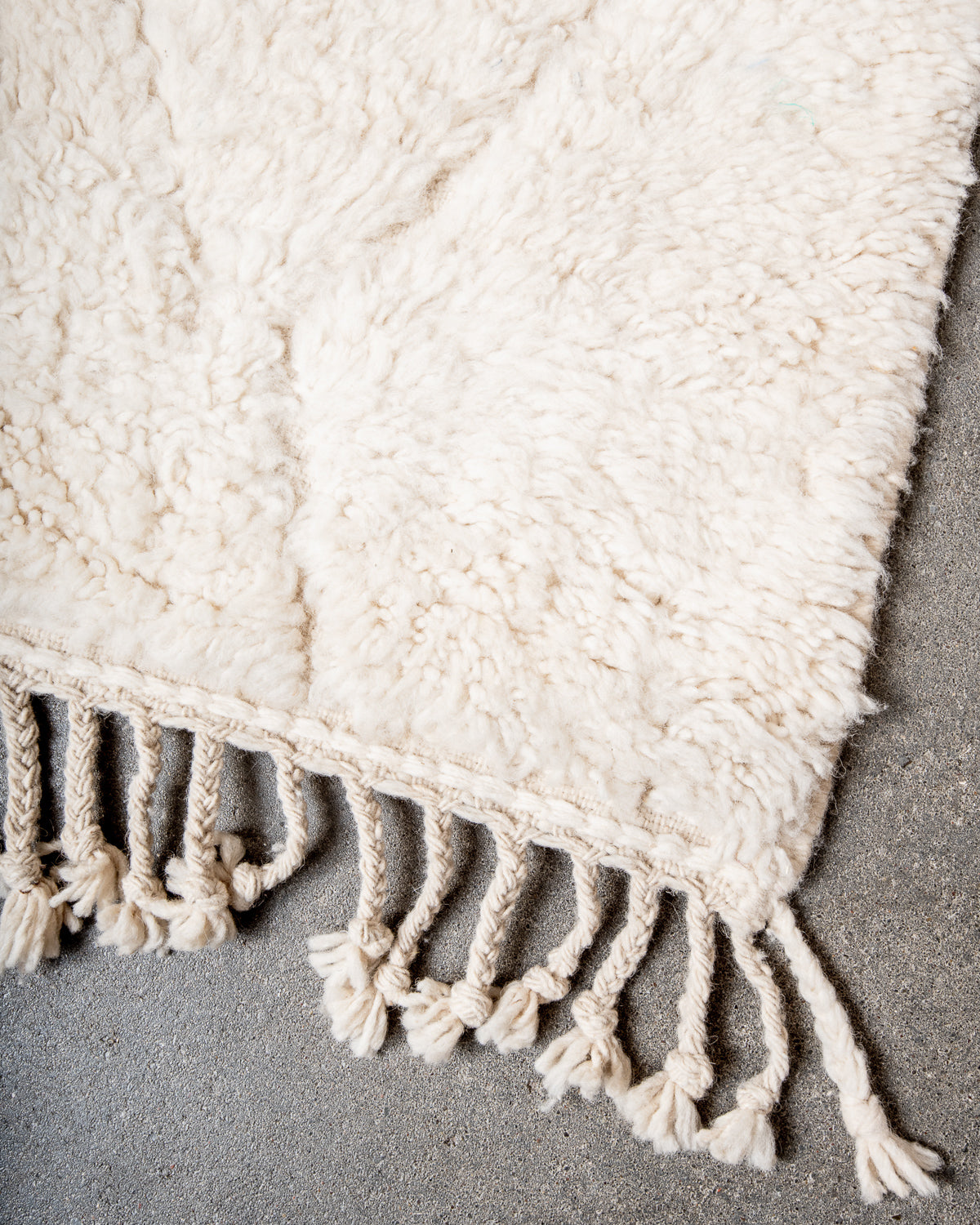 Modern, designer, handcrafted Berber rug from Morocco. Beniourain carpet with minimalist design, natural wool pile and a fluffy texture.