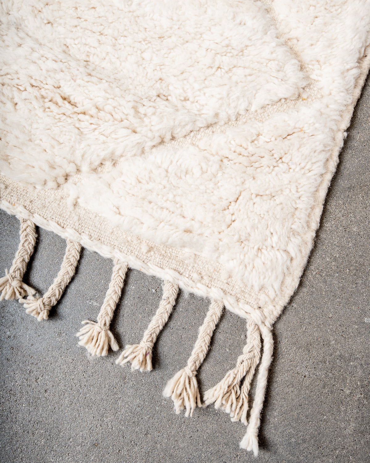 Modern, designer, handcrafted Berber rug from Morocco. Beniourain carpet with minimalist design, natural wool pile and a fluffy texture.