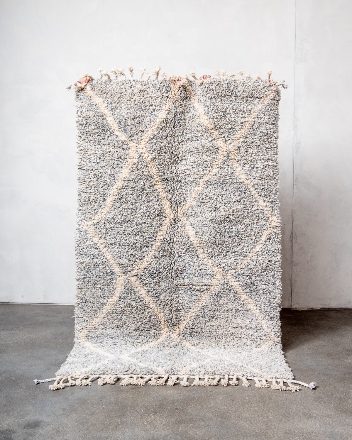 Modern, designer, handcrafted Berber rug from Morocco. Beniourain carpet with minimalist design, natural wool pile and a fluffy texture.