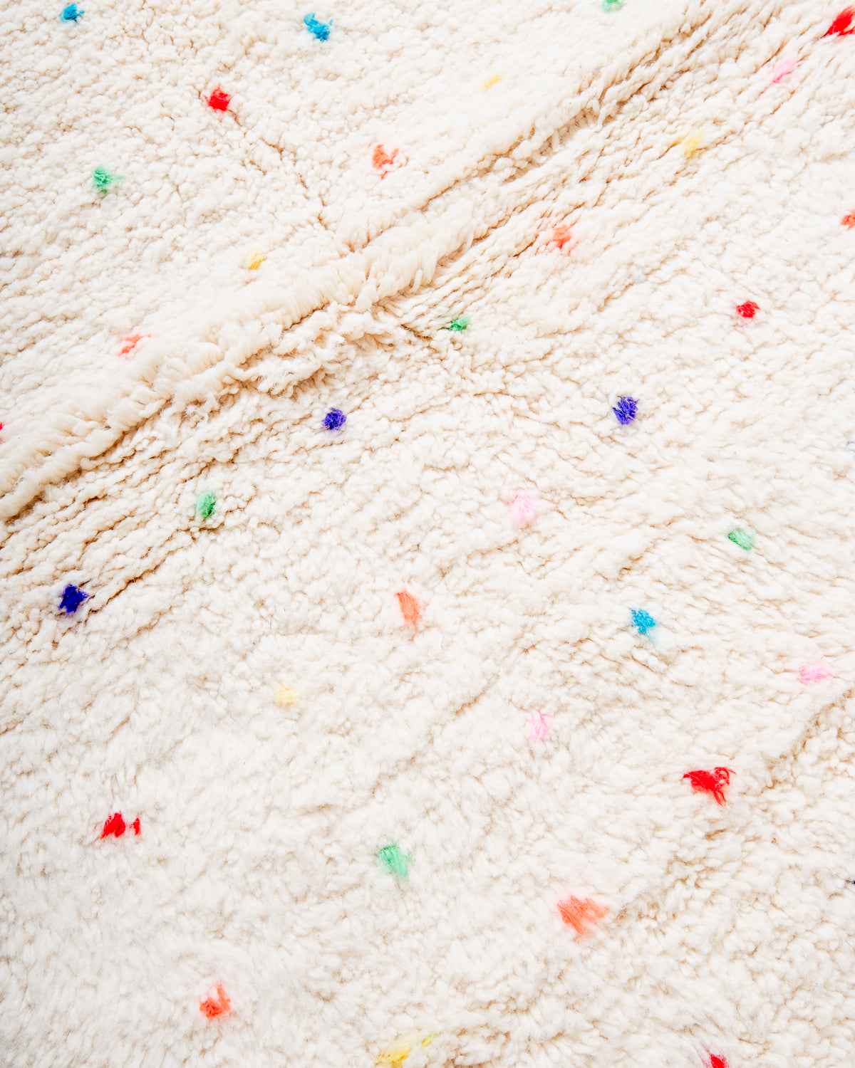 Modern, designer, handcrafted Berber rug from Morocco. Beniourain carpet with beautiful colours and patterns and fluffy wool texture. 