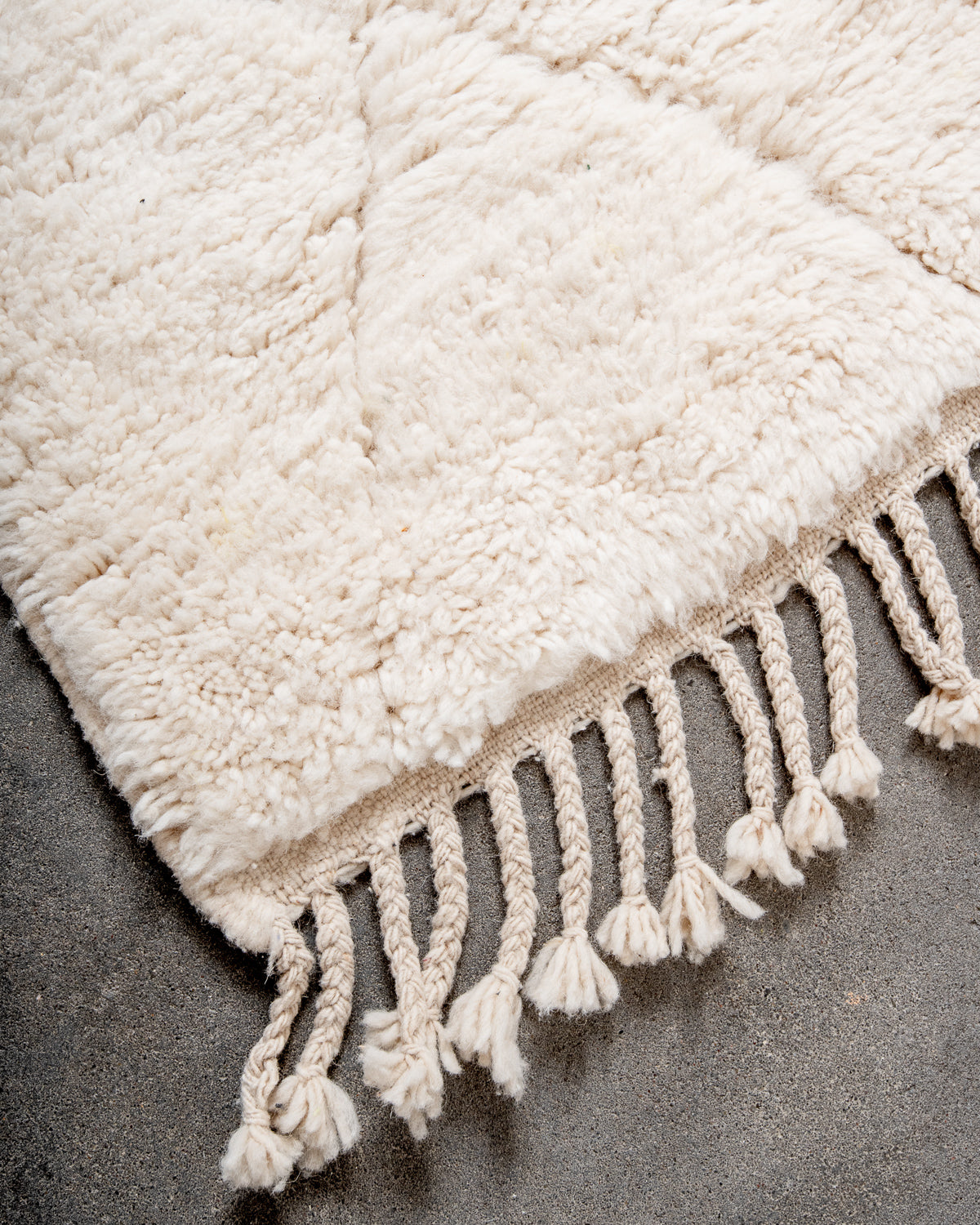 Modern, designer, handcrafted Berber rug from Morocco. Beniourain carpet with minimalist design, natural wool pile and a fluffy texture.
