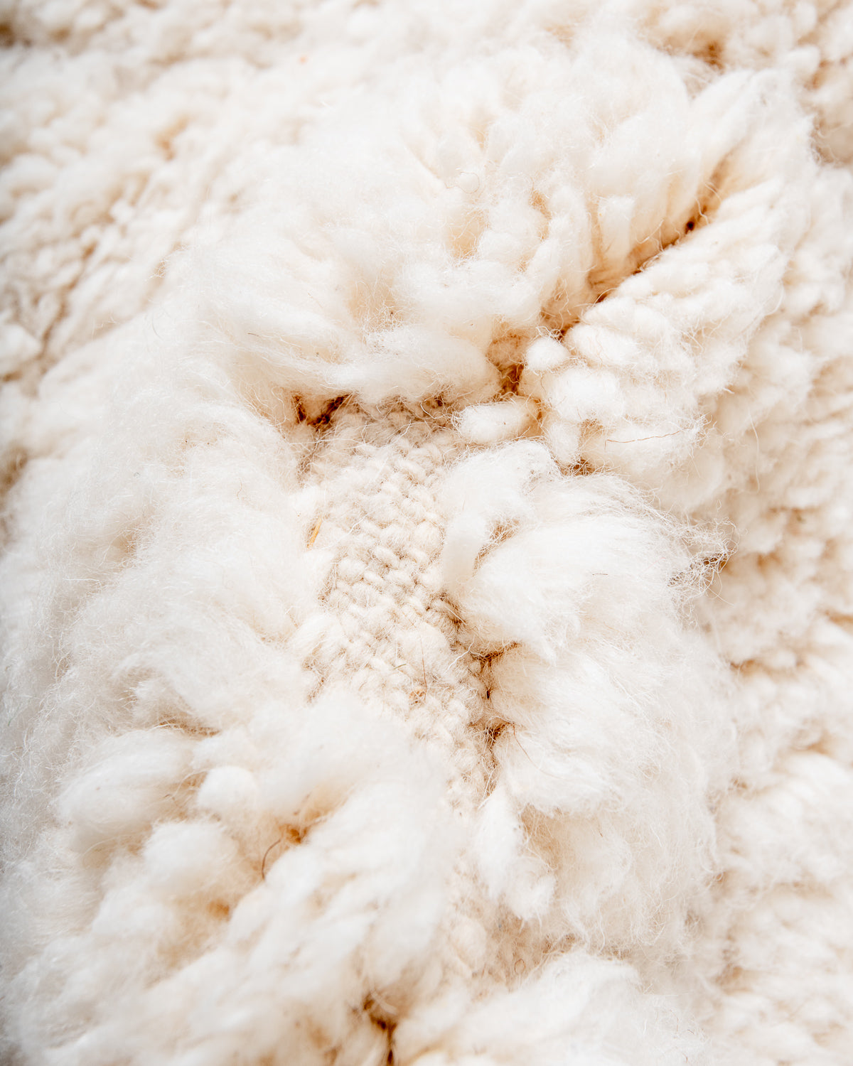 Modern, designer, handcrafted Berber rug from Morocco. Beniourain carpet with minimalist design, natural wool pile and a fluffy texture.