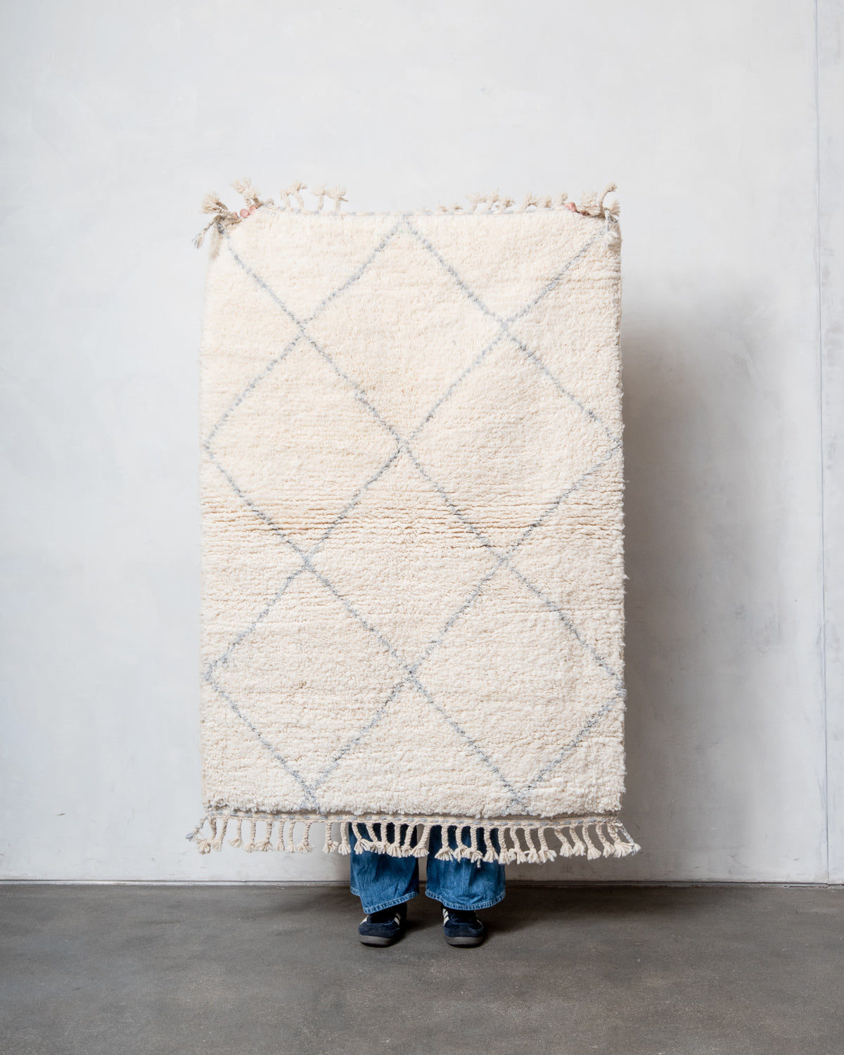 Modern, designer, handcrafted Berber rug from Morocco. Beniourain carpet with minimalist design, natural wool pile and a fluffy texture.