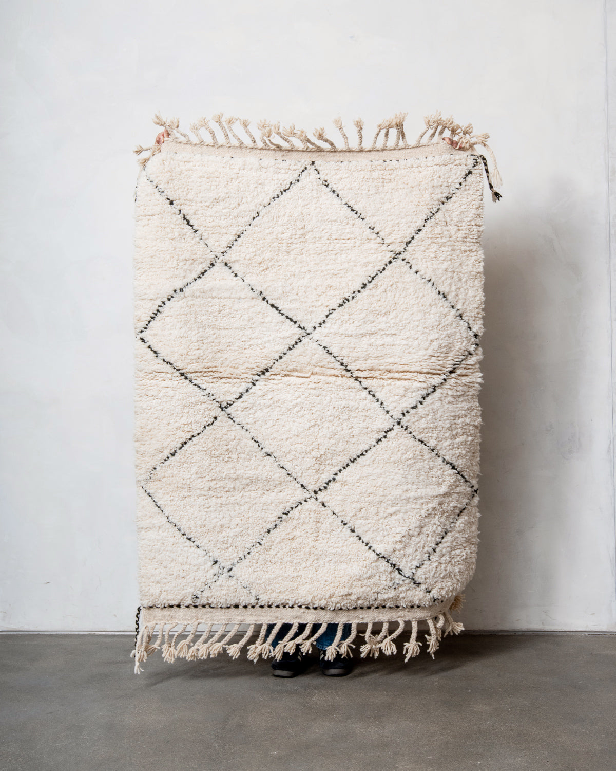 Modern, designer, handcrafted Berber rug from Morocco. Beniourain carpet with minimalist design, natural wool pile and a fluffy texture.