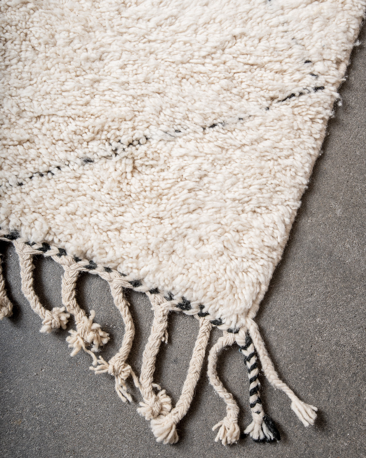 Modern, designer, handcrafted Berber rug from Morocco. Beniourain carpet with minimalist design, natural wool pile and a fluffy texture.