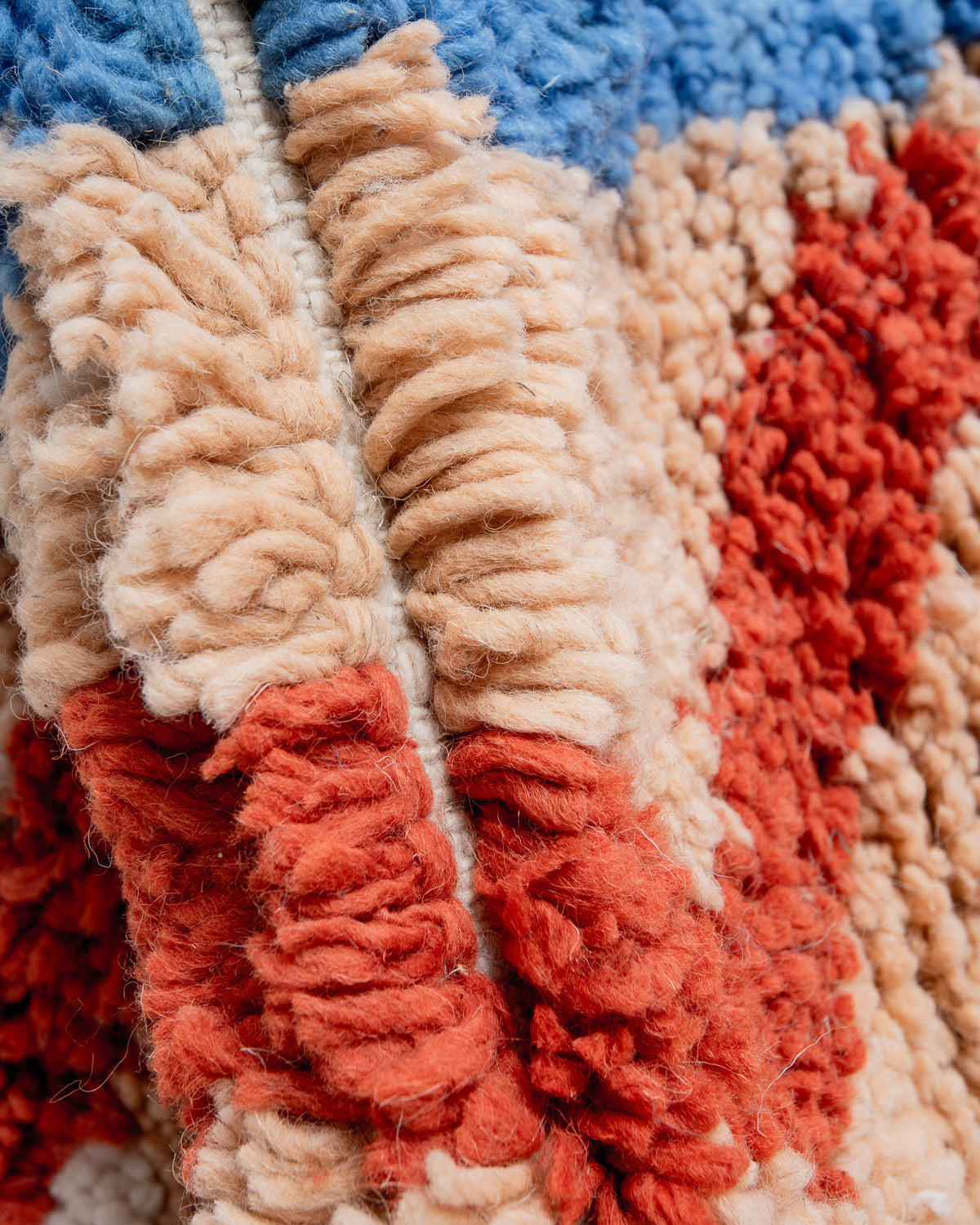 Modern, designer, handcrafted Berber rug from Morocco. Beniourain carpet with beautiful colours and patterns and fluffy wool texture.