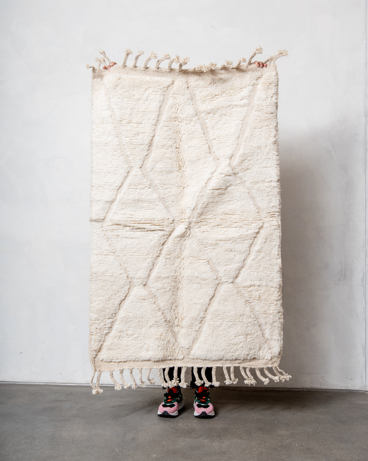 Modern, designer, handcrafted Berber rug from Morocco. Beniourain carpet with minimalist design, natural wool pile and a fluffy texture.