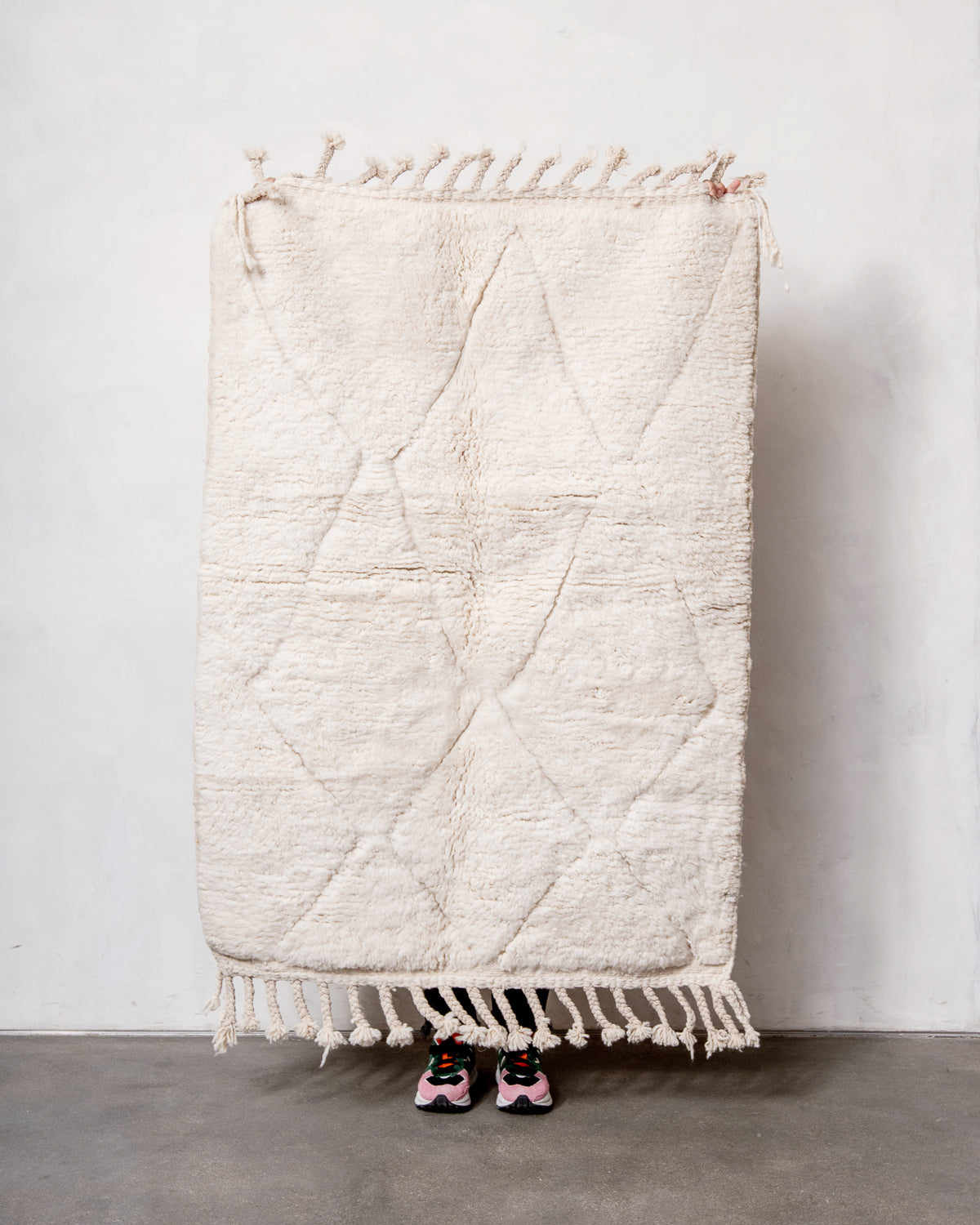 Modern, designer, handcrafted Berber rug from Morocco. Beniourain carpet with minimalist design, natural wool pile and a fluffy texture.