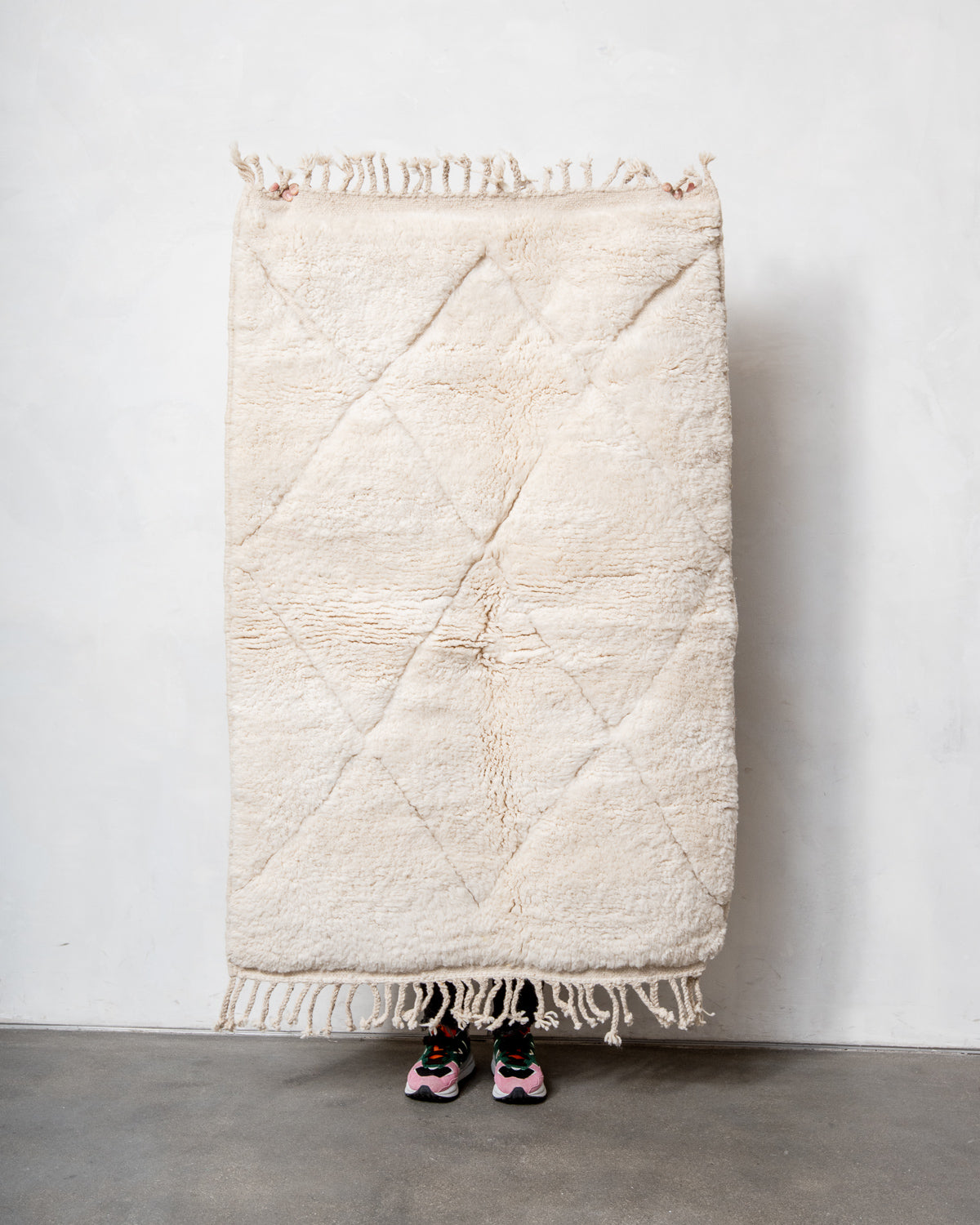 Modern, designer, handcrafted Berber rug from Morocco. Beniourain carpet with minimalist design, natural wool pile and a fluffy texture.