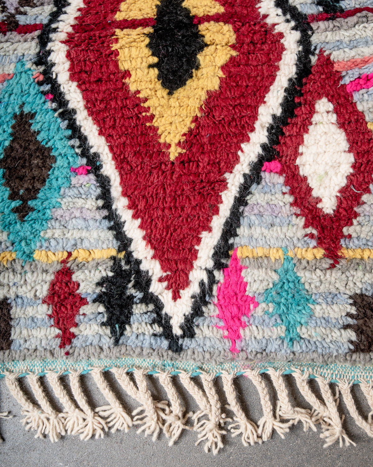 Modern, designer, handcrafted Berber runner rug from Morocco. Beniourain carpet with beautiful colours and patterns and fluffy wool texture.