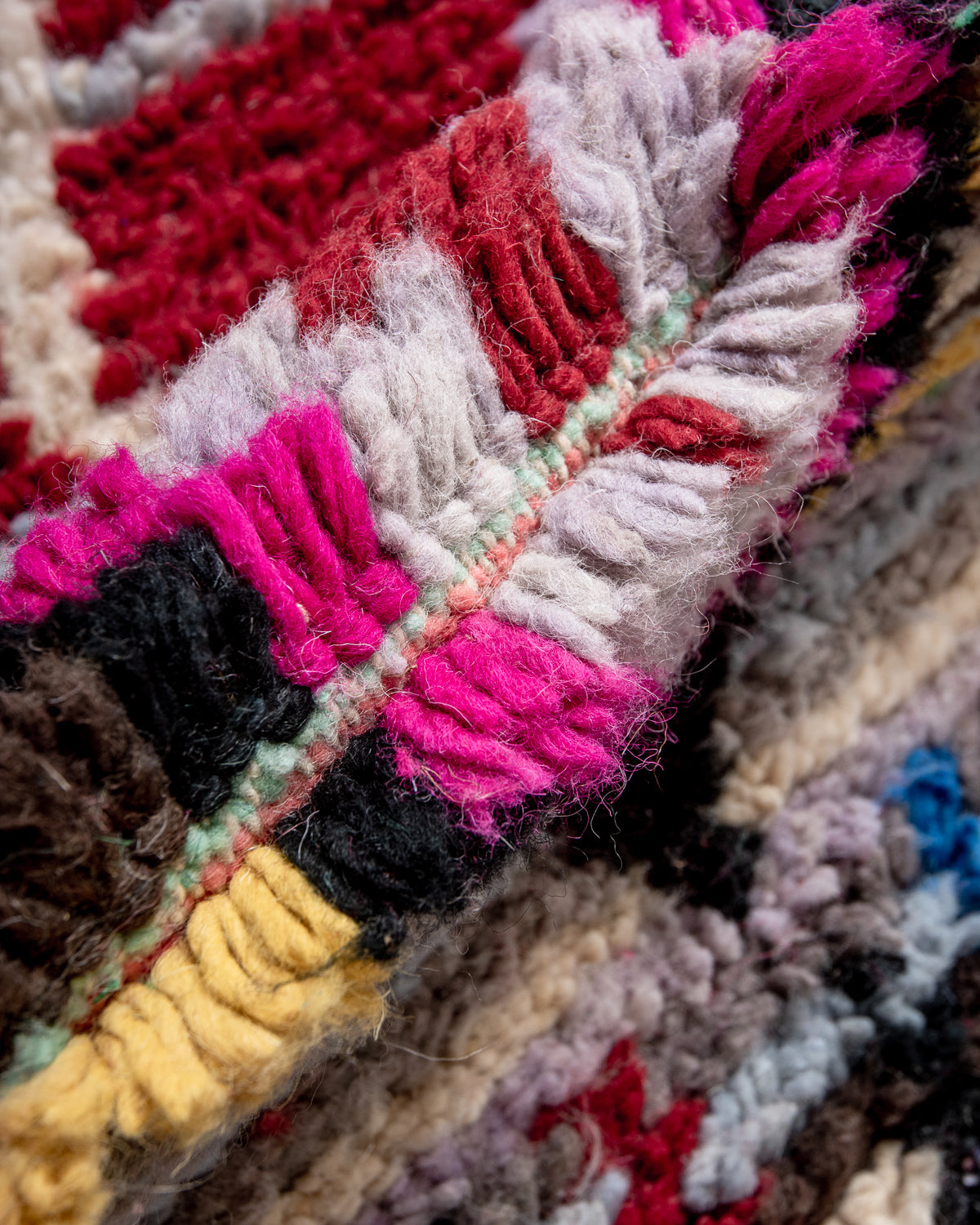 Modern, designer, handcrafted Berber runner rug from Morocco. Beniourain carpet with beautiful colours and patterns and fluffy wool texture.