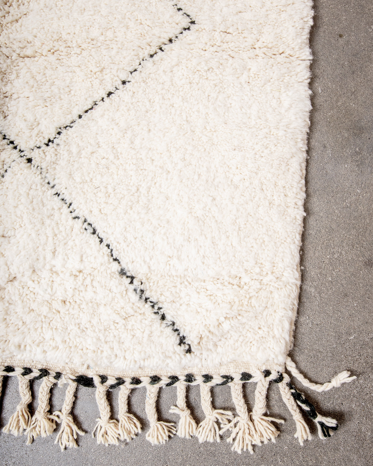 Modern, designer, handcrafted Berber rug from Morocco. Beniourain carpet with minimalist design, natural wool pile and a fluffy texture.