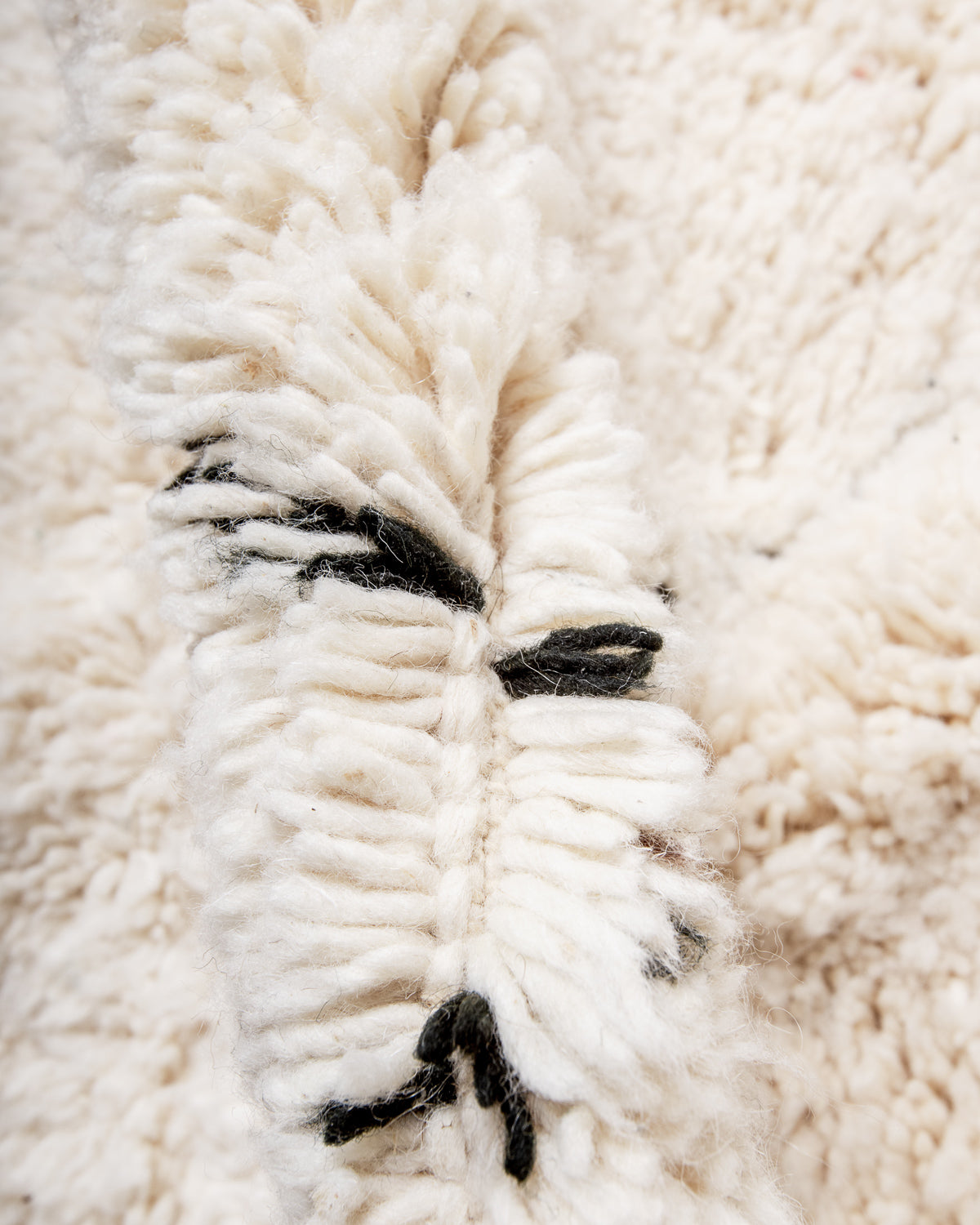 Modern, designer, handcrafted Berber rug from Morocco. Beniourain carpet with minimalist design, natural wool pile and a fluffy texture.