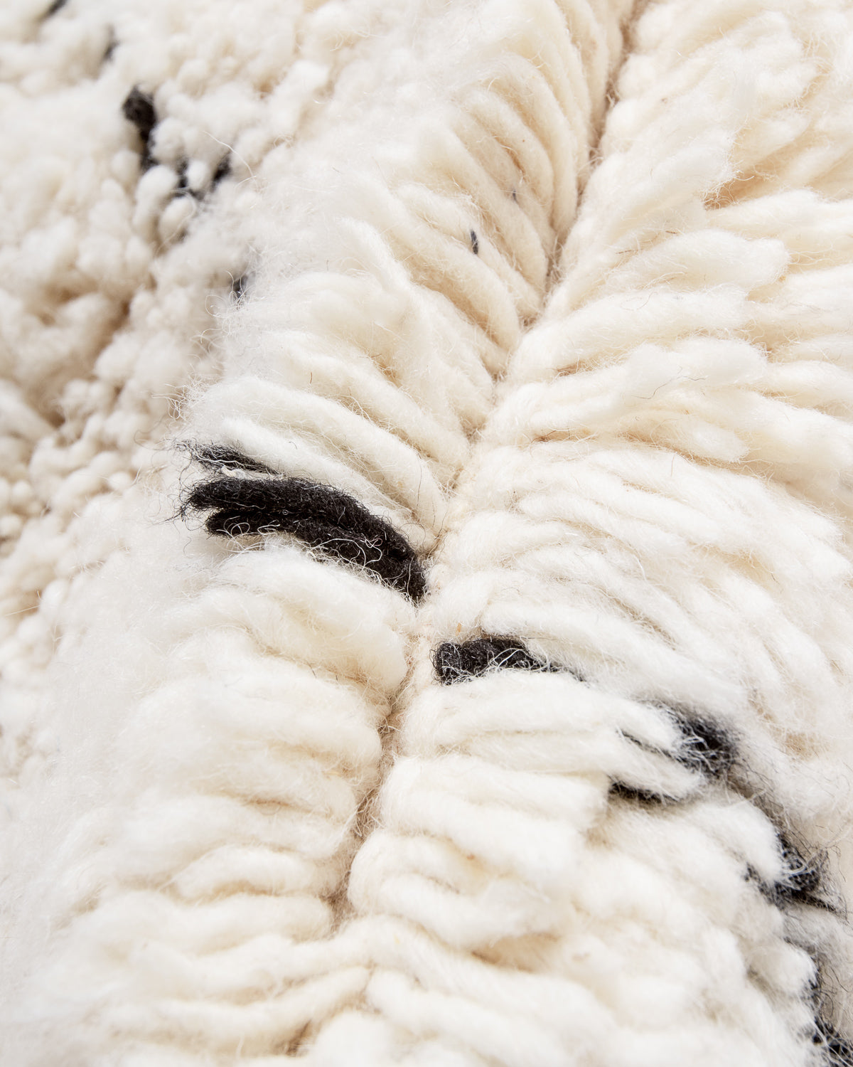 Modern, designer, handcrafted Berber rug from Morocco. Beniourain carpet with minimalist design, natural wool pile and a fluffy texture.