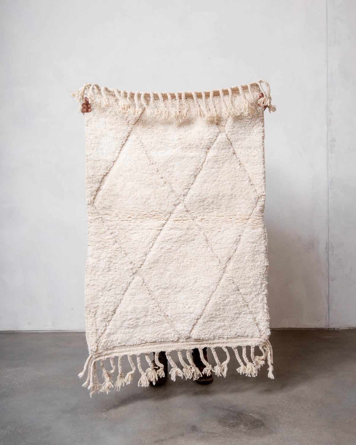 Modern, designer, handcrafted Berber rug from Morocco. Beniourain carpet with minimalist design, natural wool pile and a fluffy texture.