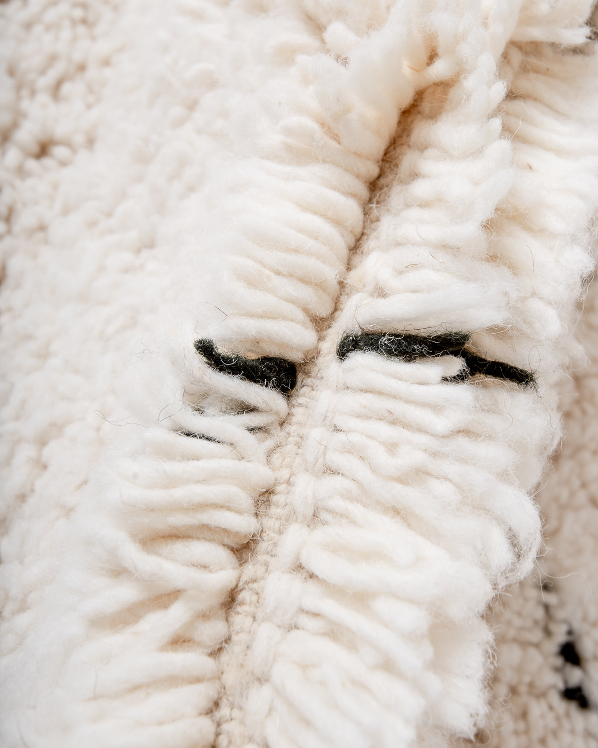 Modern, designer, handcrafted Berber rug from Morocco. Beniourain carpet with minimalist design, natural wool pile and a fluffy texture.