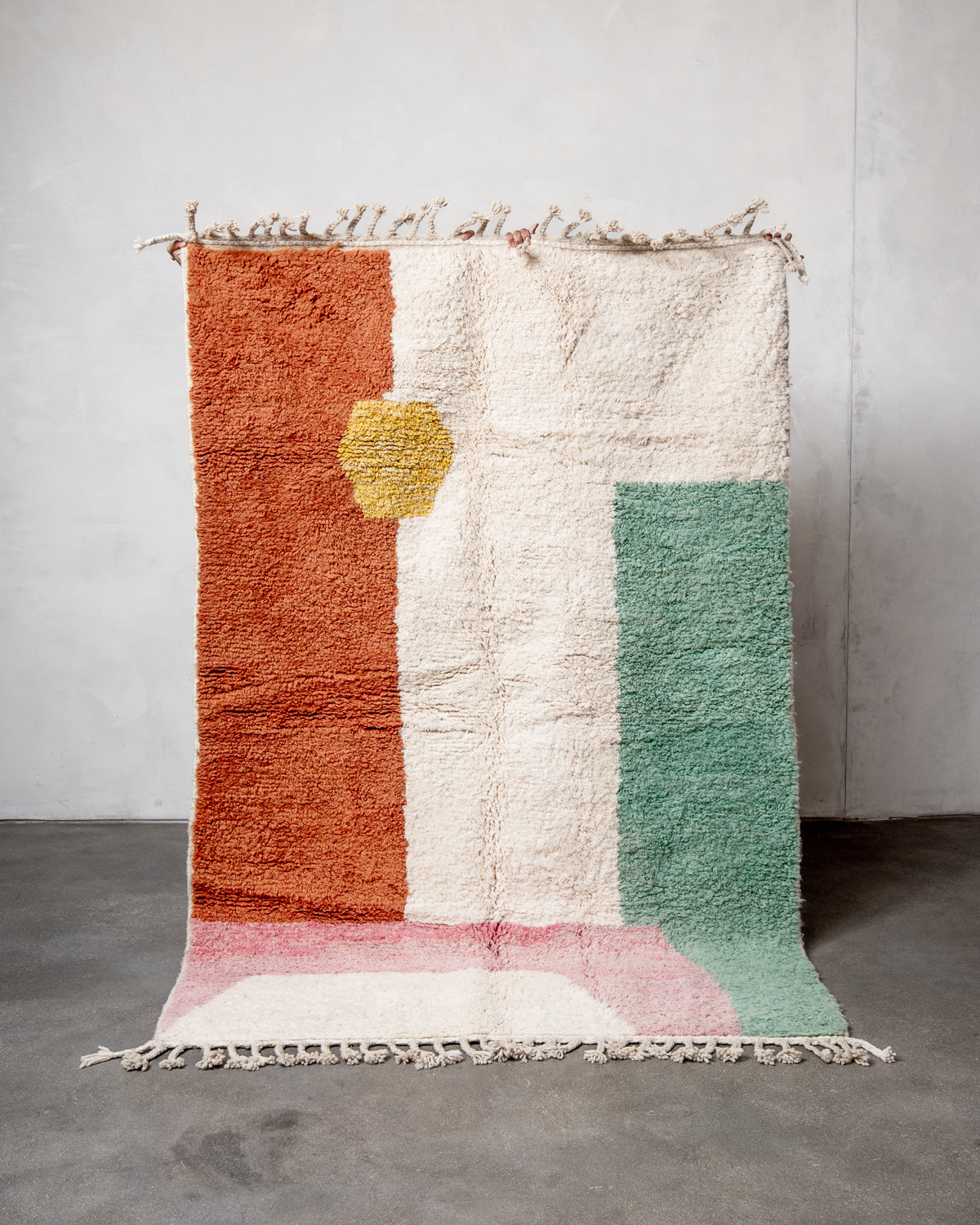 Modern, designer, handcrafted Berber rug from Morocco. Beniourain carpet with beautiful colours and patterns and fluffy wool texture.