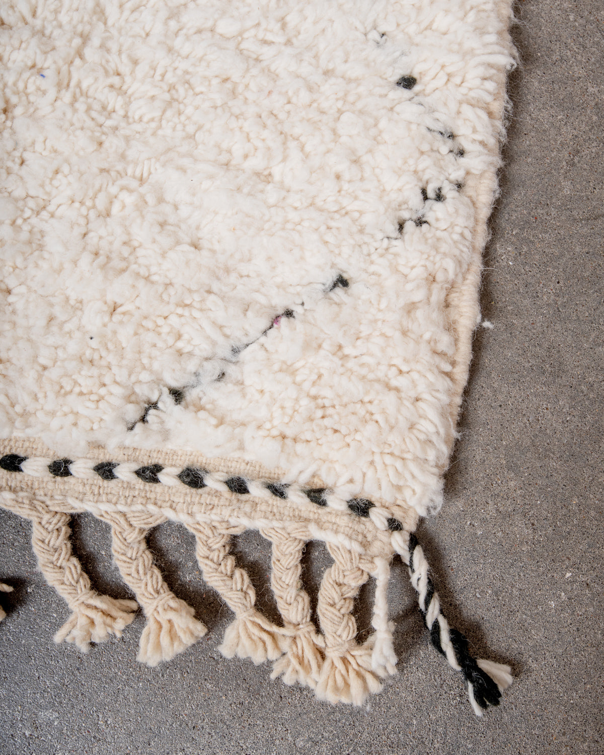 Modern, designer, handcrafted Berber rug from Morocco. Beniourain carpet with minimalist design, natural wool pile and a fluffy texture.