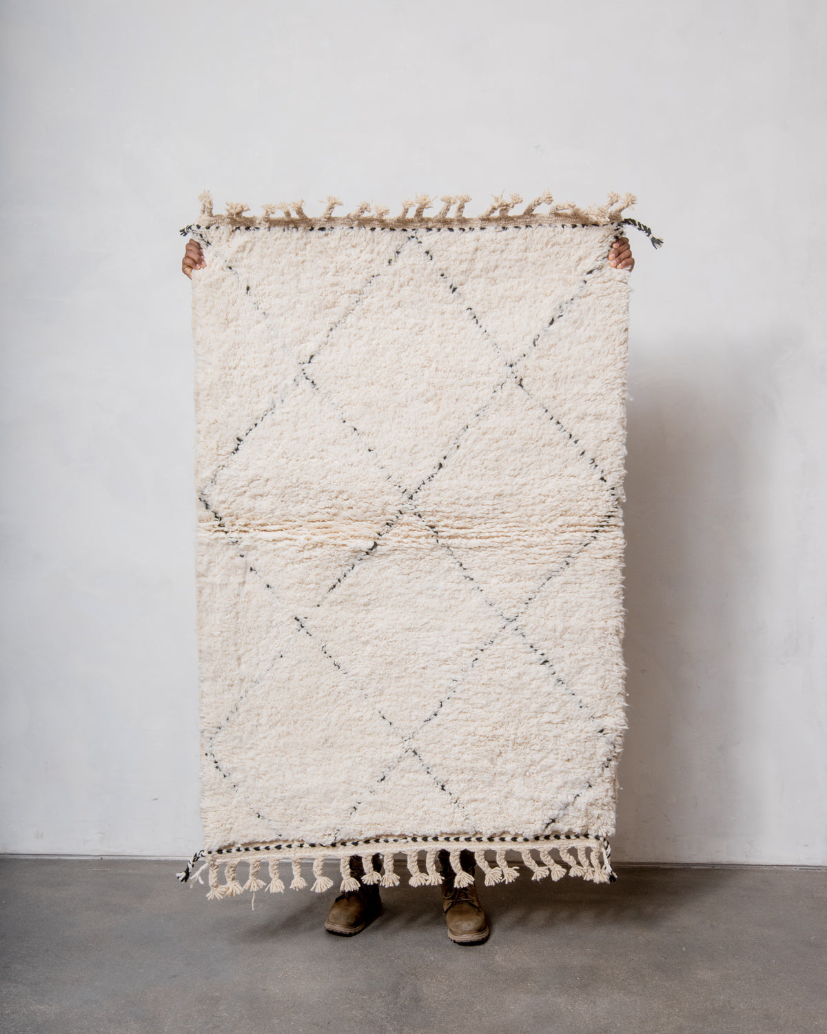Modern, designer, handcrafted Berber rug from Morocco. Beniourain carpet with minimalist design, natural wool pile and a fluffy texture.