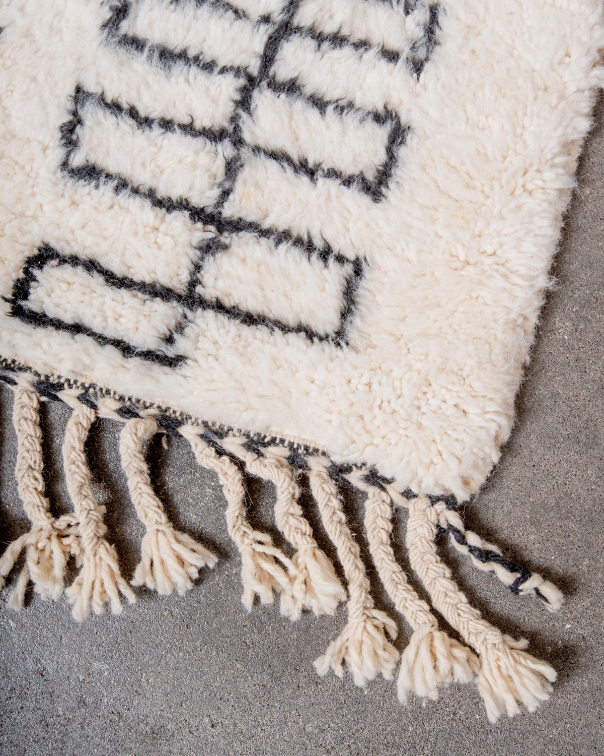 Modern, designer, handcrafted Berber rug from Morocco. Beniourain carpet with minimalist design, natural wool pile and a fluffy texture.