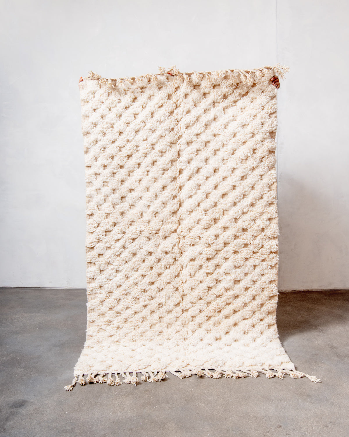 Modern, designer, handcrafted Berber rug from Morocco. Beniourain carpet with minimalist design, natural wool pile and a fluffy texture.