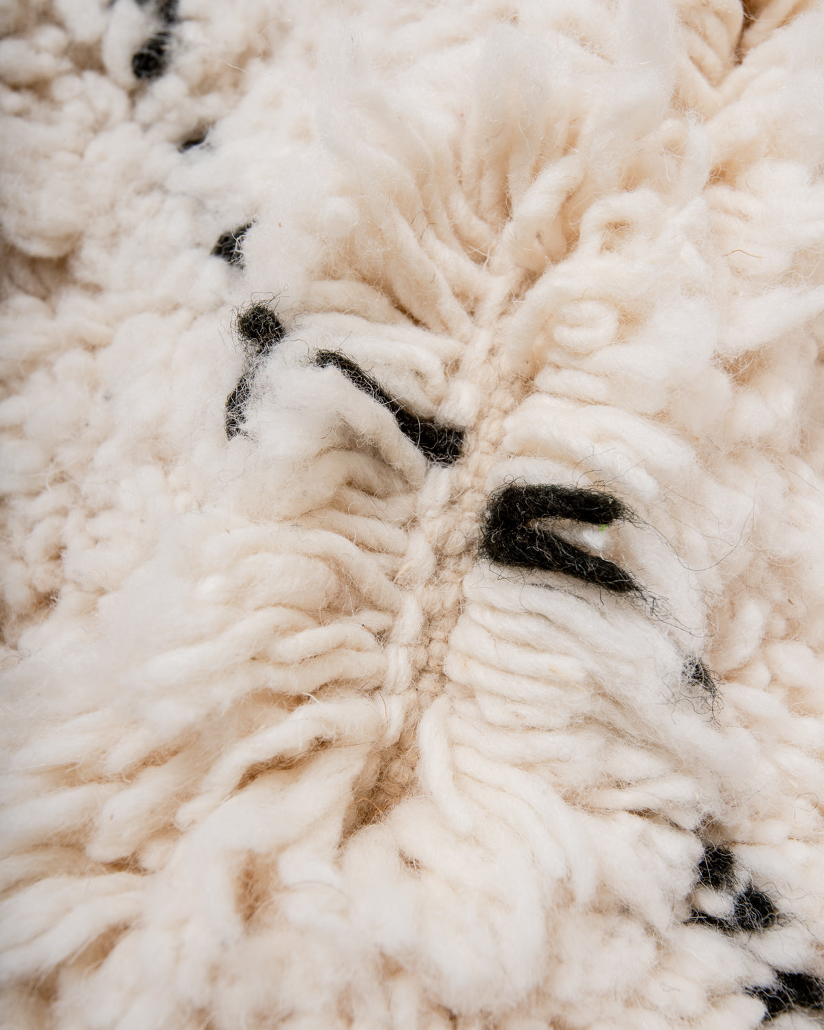 Modern, designer, handcrafted Berber rug from Morocco. Beniourain carpet with minimalist design, natural wool pile and a fluffy texture.