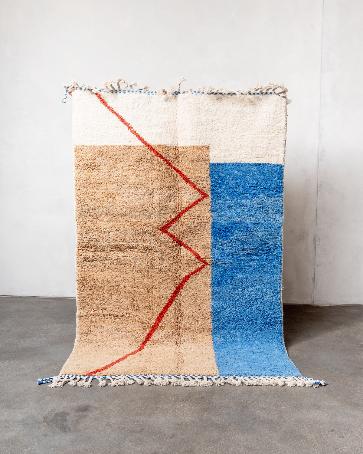 Modern, designer, handcrafted Berber rug from Morocco. Beniourain carpet with beautiful colours and patterns and fluffy wool texture.