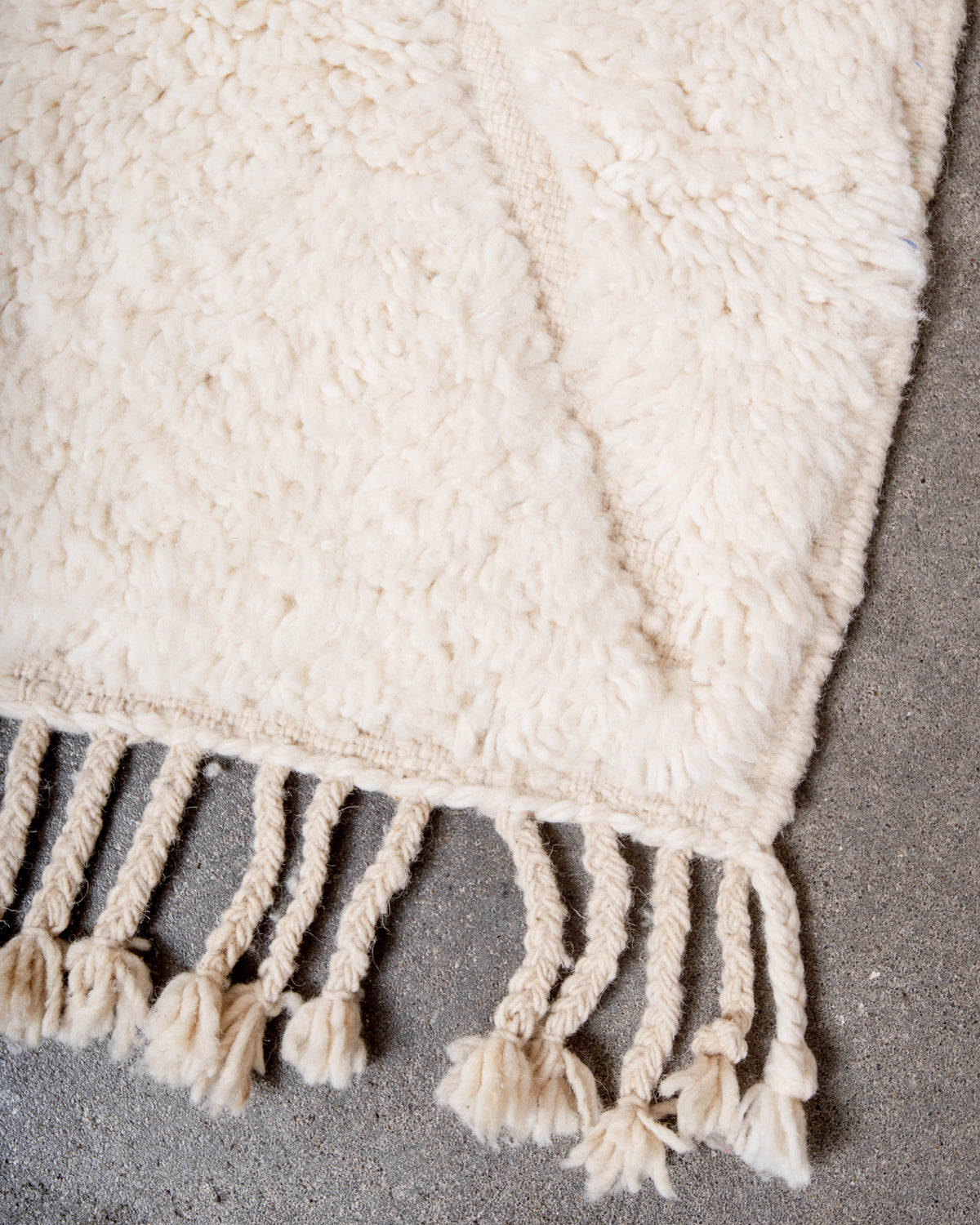 Modern, designer, handcrafted Berber rug from Morocco. Beniourain carpet with minimalist design, natural wool pile and a fluffy texture.