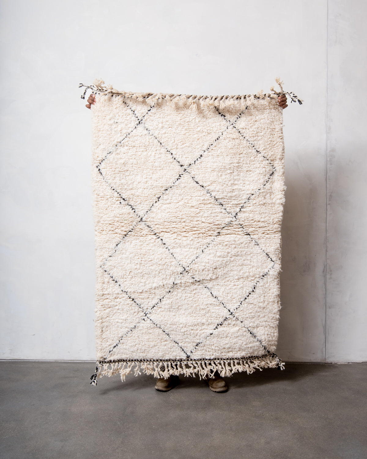 Modern, designer, handcrafted Berber rug from Morocco. Beniourain carpet with minimalist design, natural wool pile and a fluffy texture.