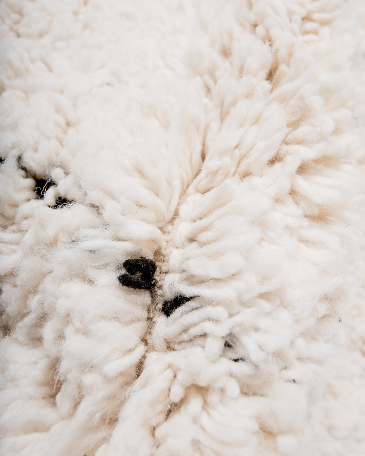 Modern, designer, handcrafted Berber rug from Morocco. Beniourain carpet with minimalist design, natural wool pile and a fluffy texture.