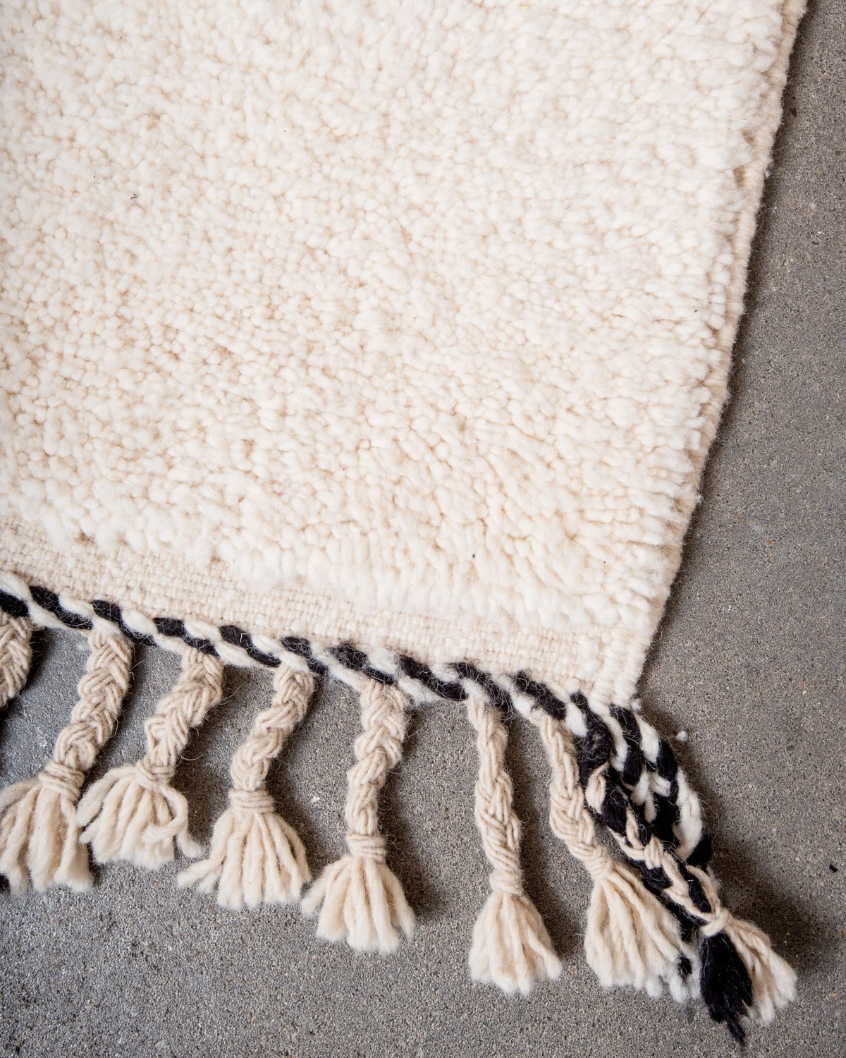 Modern, designer, handcrafted Berber rug from Morocco. Beniourain carpet with minimalist design, natural wool pile and a fluffy texture.