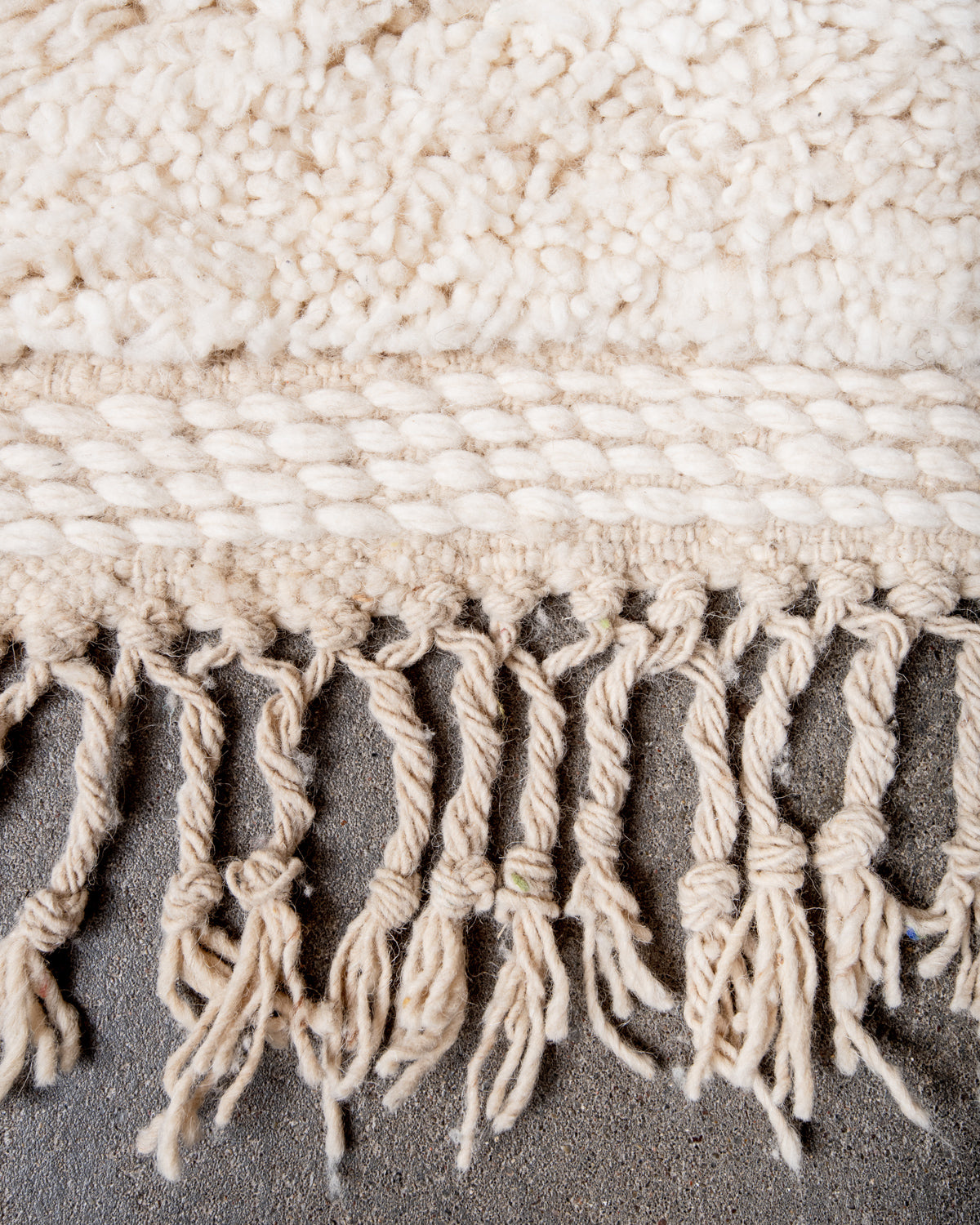 Modern, designer, handcrafted Berber rug from Morocco. Beniourain carpet with minimalist design, natural wool pile and a fluffy texture.