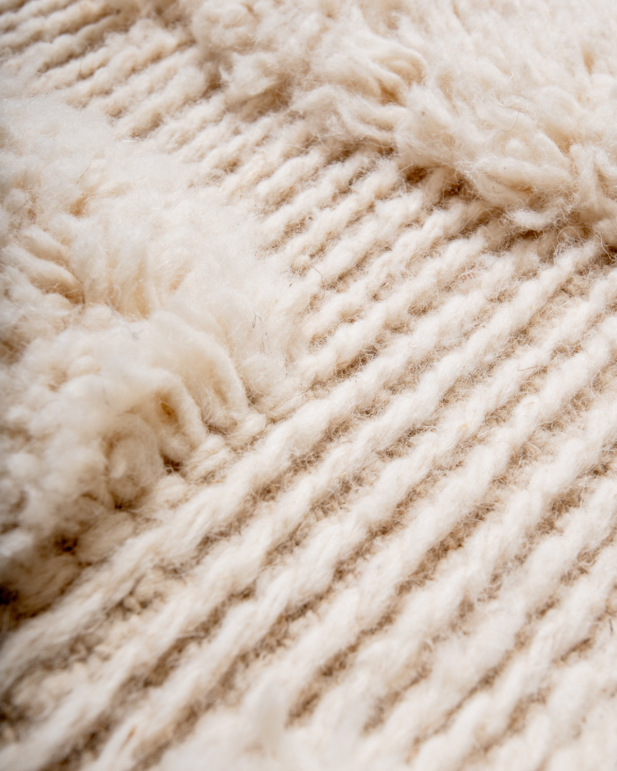 Modern, designer, handcrafted Berber rug from Morocco. Beniourain carpet with minimalist design, natural wool pile and a fluffy texture.