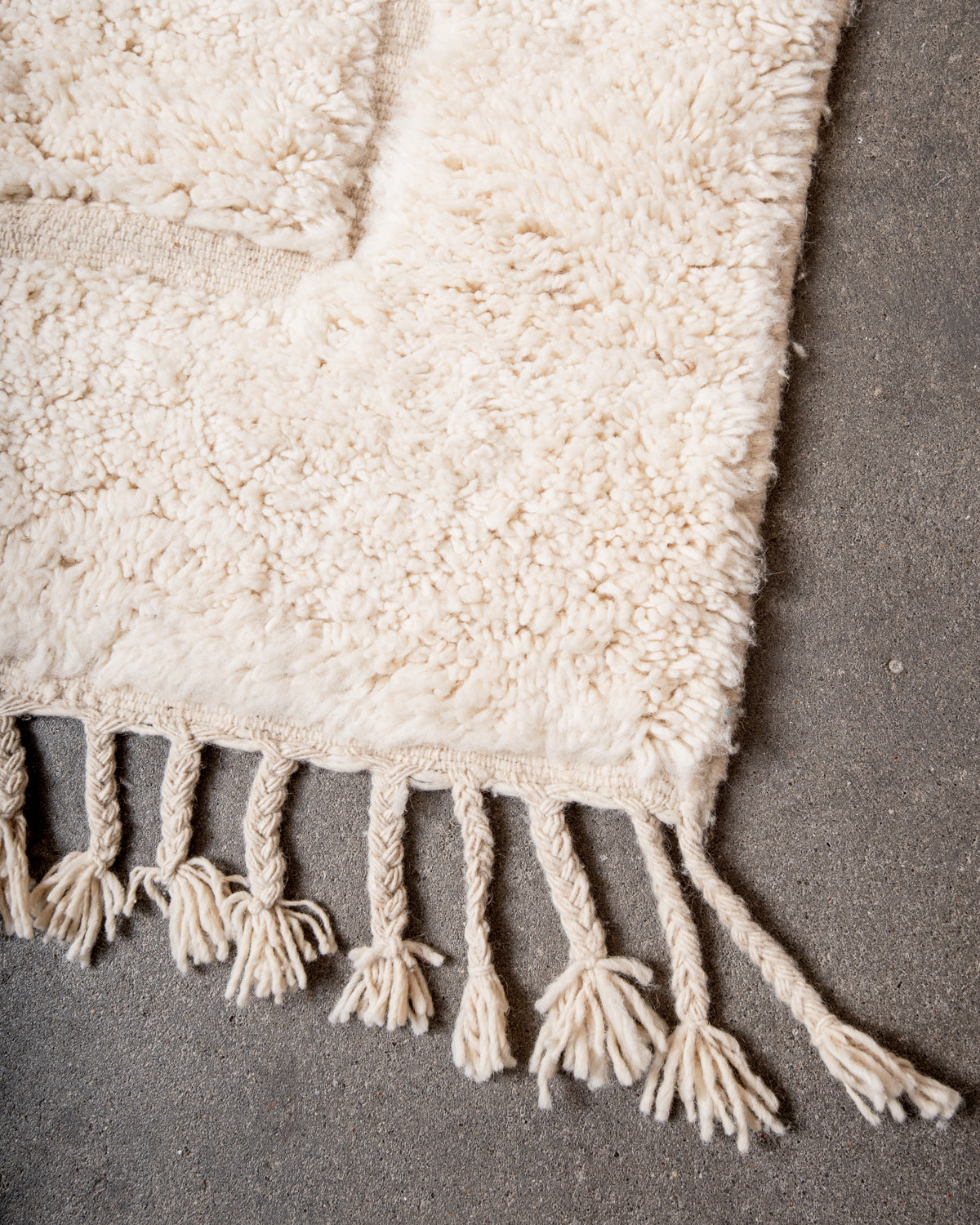 Modern, designer, handcrafted Berber rug from Morocco. Beniourain carpet with minimalist design, natural wool pile and a fluffy texture.