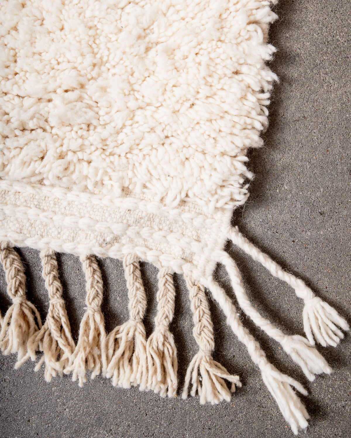 Modern, designer, handcrafted Berber rug from Morocco. Beniourain carpet with minimalist design, natural wool pile and a fluffy texture.