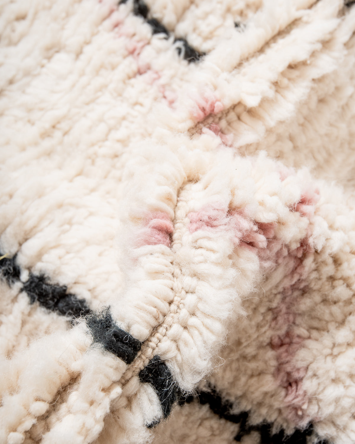 Modern, designer, handcrafted Berber rug from Morocco. Beniourain carpet with beautiful colours and patterns and fluffy wool texture.