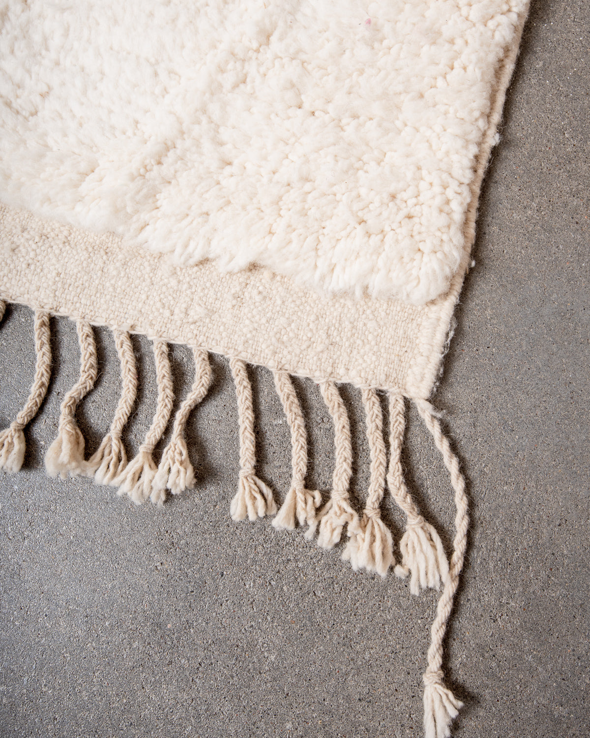 Modern, designer, handcrafted Berber rug from Morocco. Beniourain carpet with minimalist design, natural wool pile and a fluffy texture.