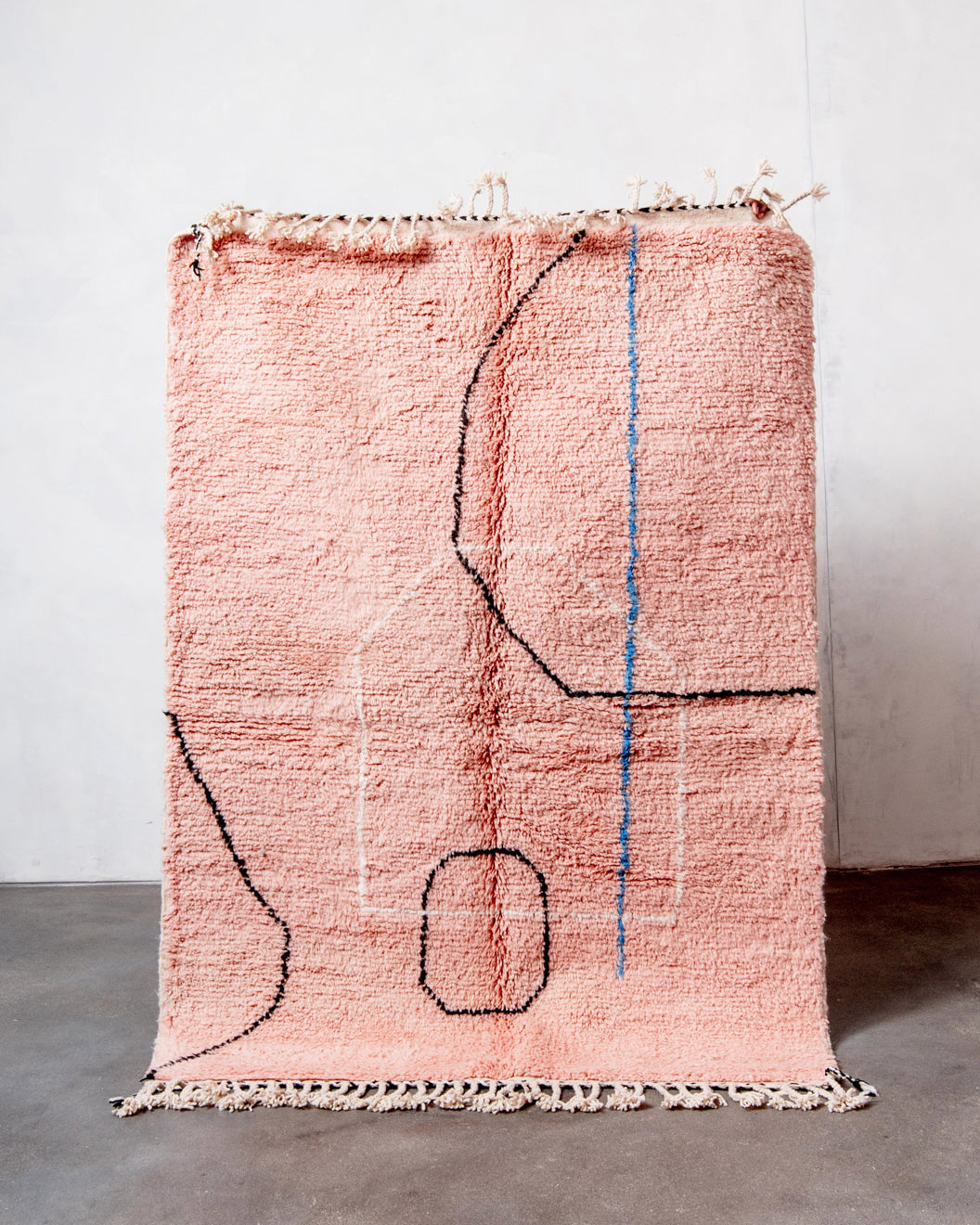 Modern, designer, handcrafted Berber rug from Morocco. Beniourain carpet with beautiful colours and patterns and fluffy wool texture.