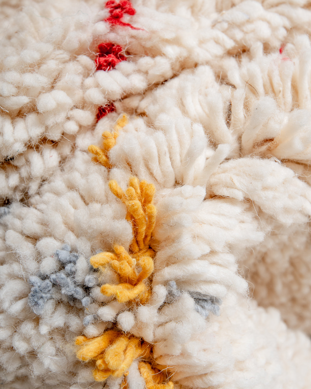 Modern, designer, handcrafted Berber rug from Morocco. Beniourain carpet with beautiful colours and patterns and fluffy wool texture.