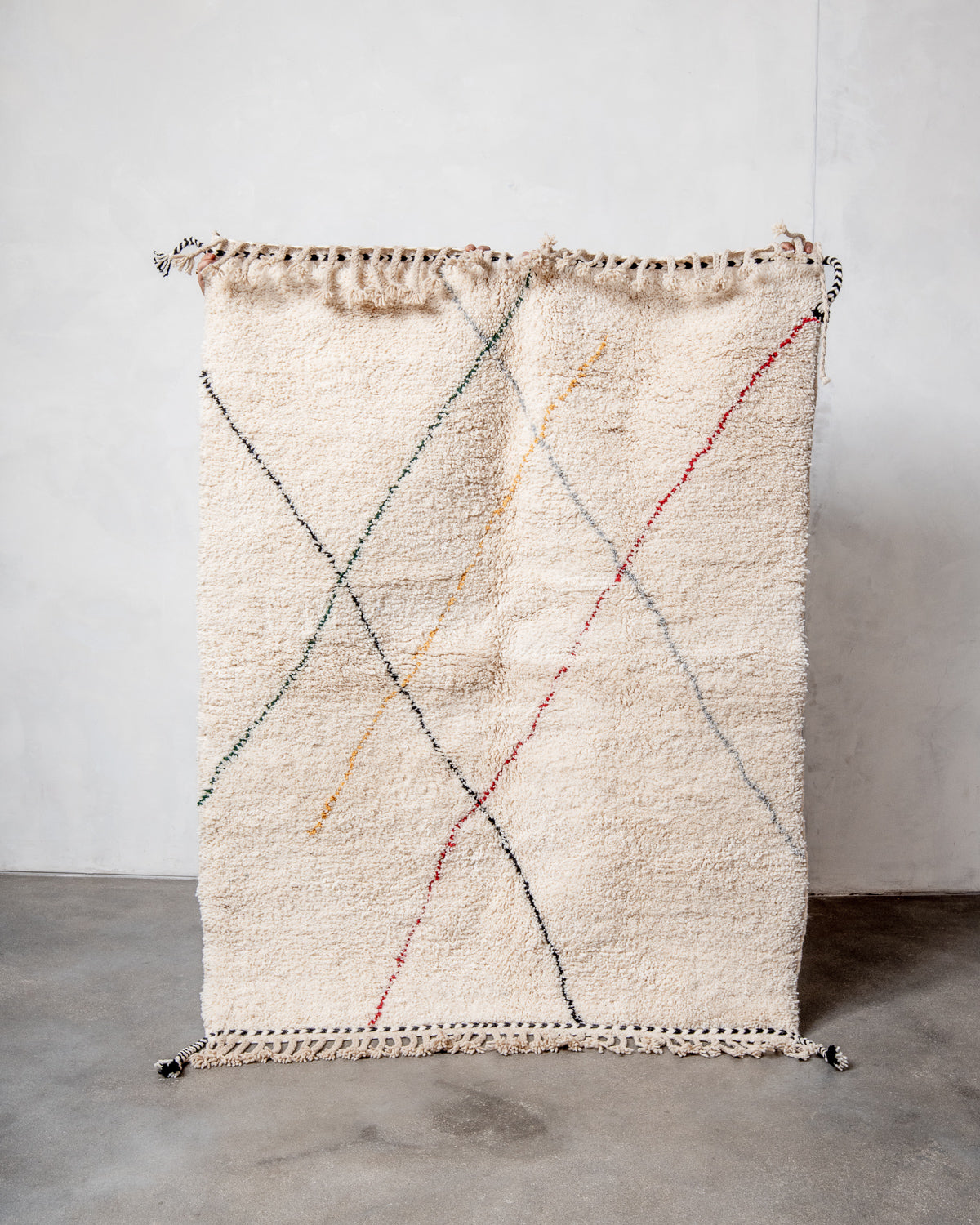 Modern, designer, handcrafted Berber rug from Morocco. Beniourain carpet with beautiful colours and patterns and fluffy wool texture.