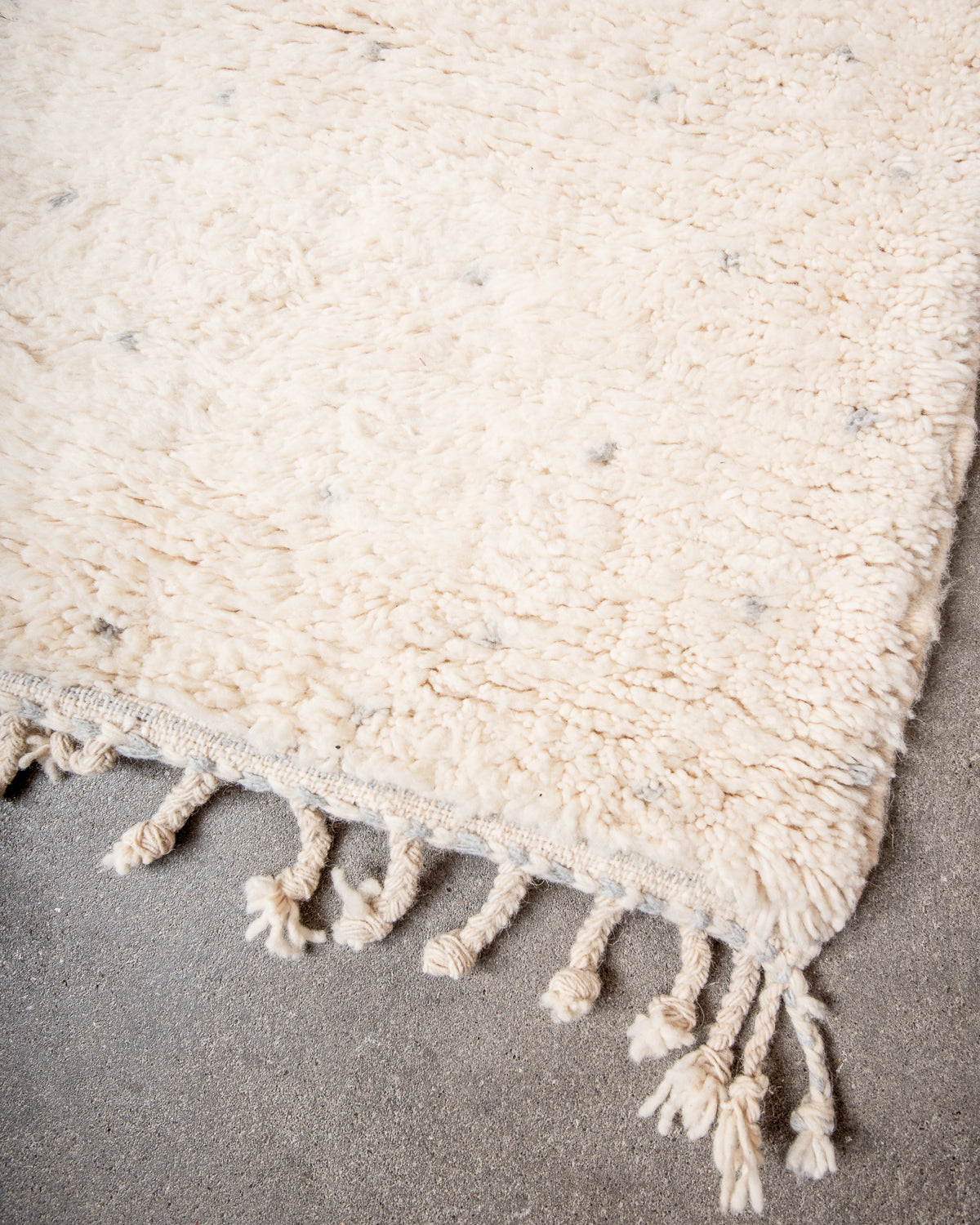 Modern, designer, handcrafted Berber rug from Morocco. Beniourain carpet with beautiful colours and patterns and fluffy wool texture.