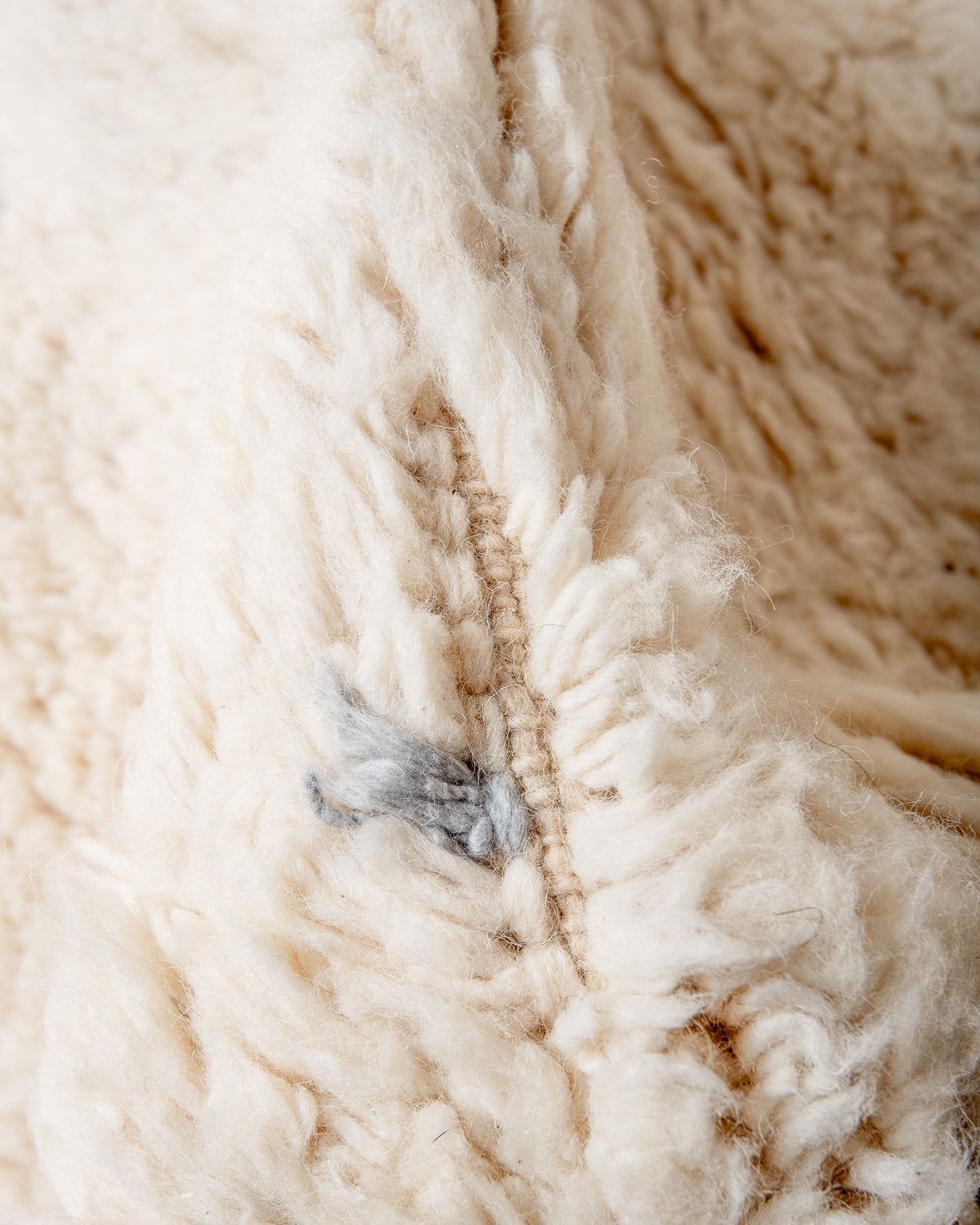 Modern, designer, handcrafted Berber rug from Morocco. Beniourain carpet with beautiful colours and patterns and fluffy wool texture.