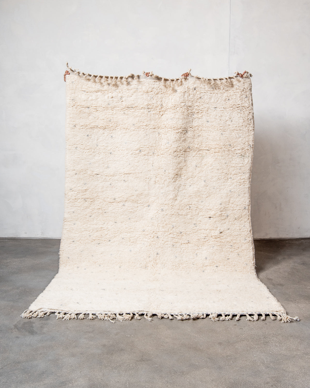 Modern, designer, handcrafted Berber rug from Morocco. Beniourain carpet with beautiful colours and patterns and fluffy wool texture.