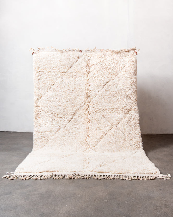 Modern, designer, handcrafted Berber rug from Morocco. Beniourain carpet with minimalist design, natural wool pile and a fluffy texture.