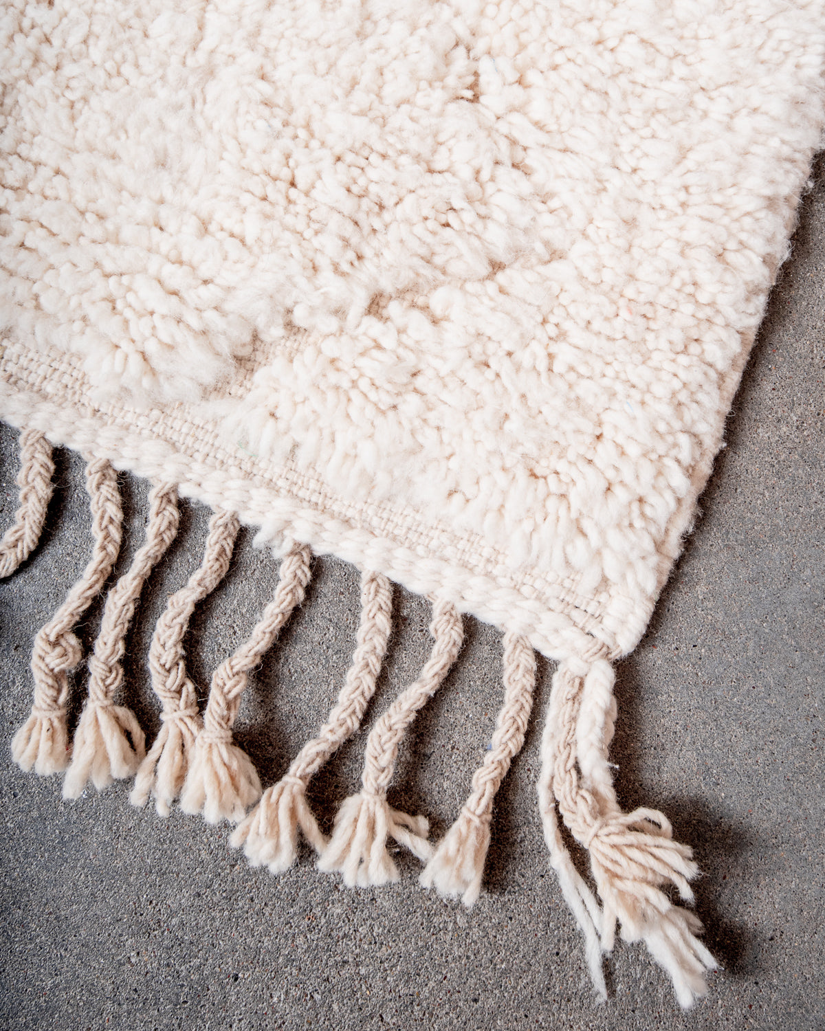 Modern, designer, handcrafted Berber rug from Morocco. Beniourain carpet with minimalist design, natural wool pile and a fluffy texture.