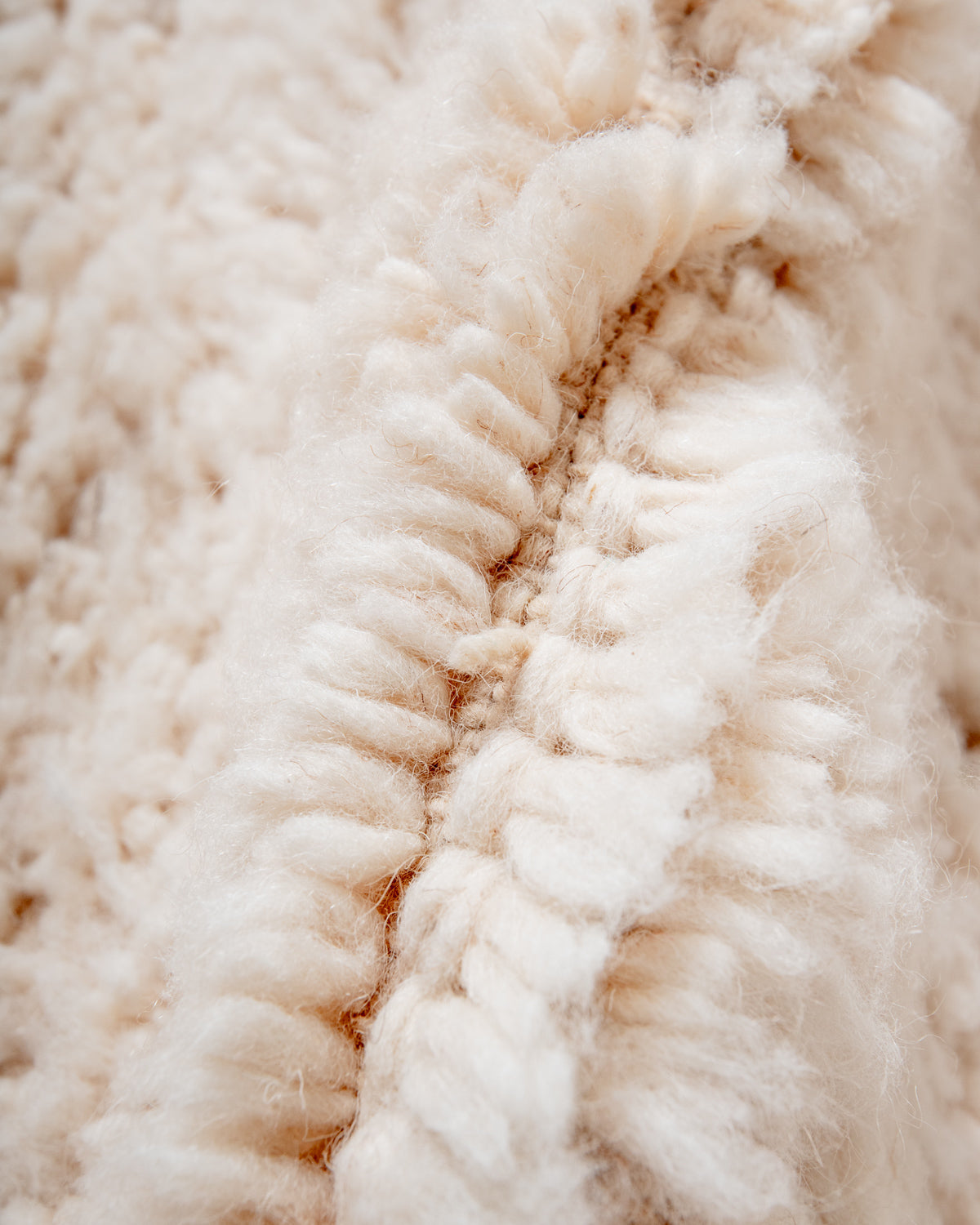 Modern, designer, handcrafted Berber rug from Morocco. Beniourain carpet with minimalist design, natural wool pile and a fluffy texture.