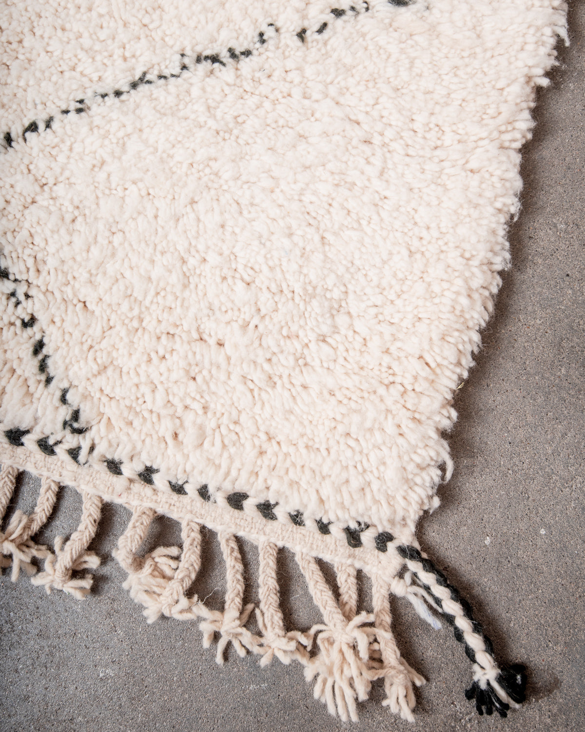Modern, designer, handcrafted Berber rug from Morocco. Beniourain carpet with minimalist design, natural wool pile and a fluffy texture.