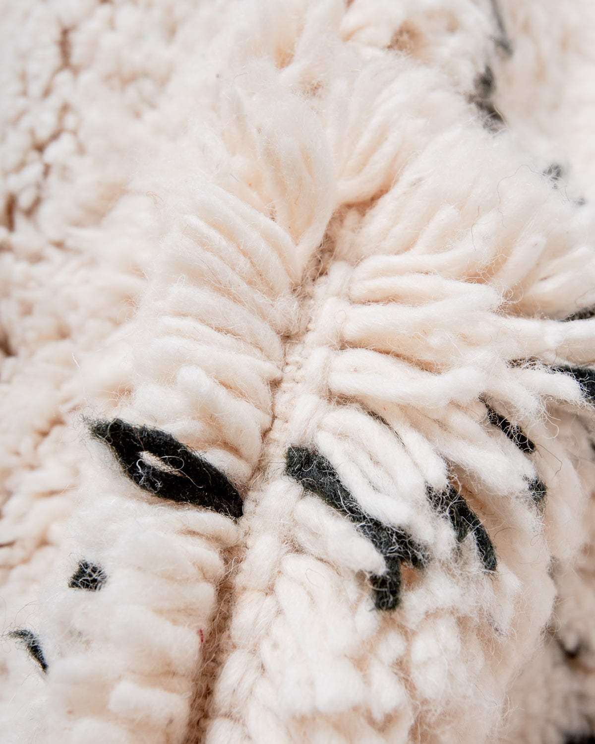 Modern, designer, handcrafted Berber rug from Morocco. Beniourain carpet with minimalist design, natural wool pile and a fluffy texture.