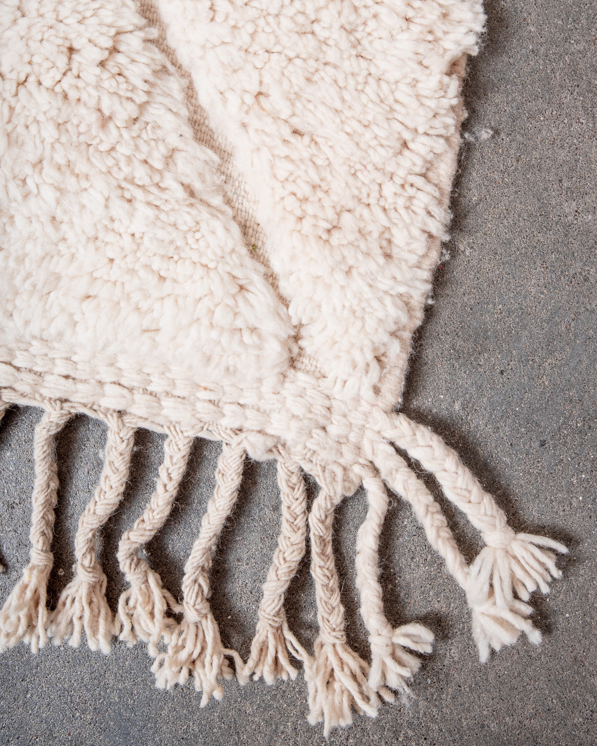 Modern, designer, handcrafted Berber rug from Morocco. Beniourain carpet with minimalist design, natural wool pile and a fluffy texture.